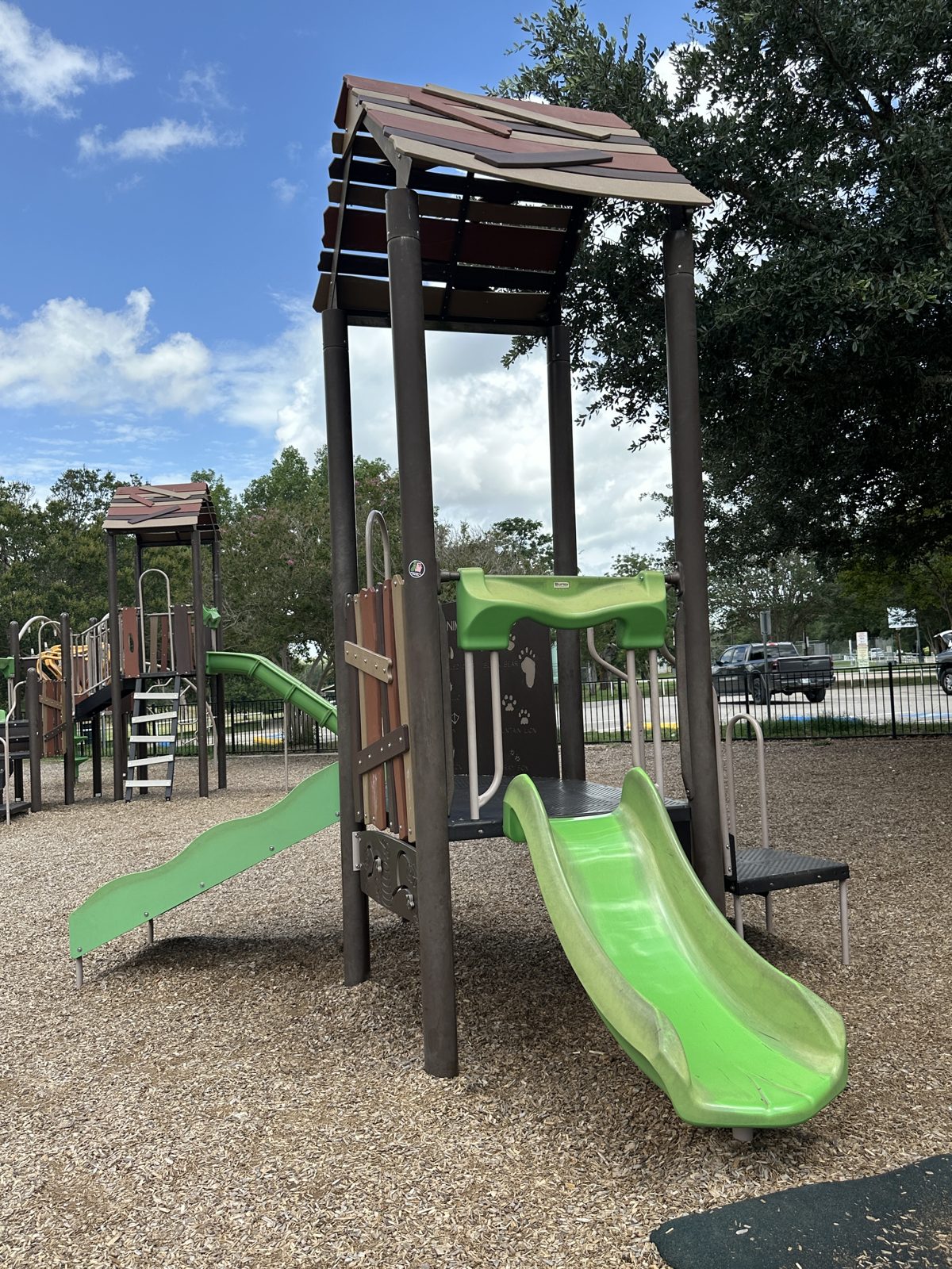 Green playground with slides