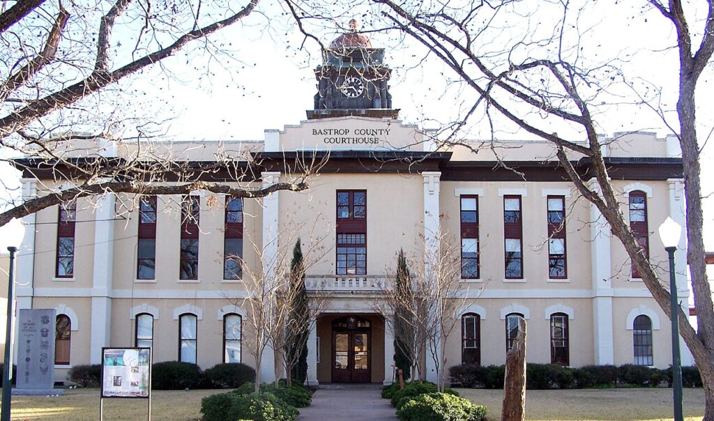 The historic 1883 Bastrop County Courthouse in Bastrop, Texas